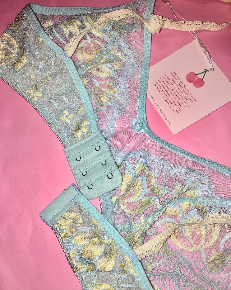 Clasp back of blue lace bra